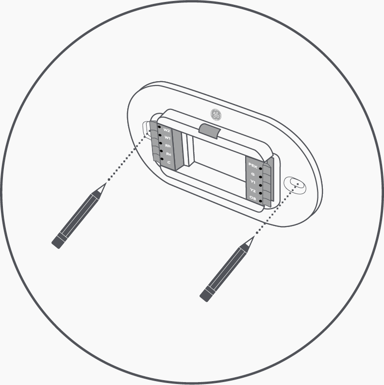 Smart thermostat installation: How to screw in the back plate.