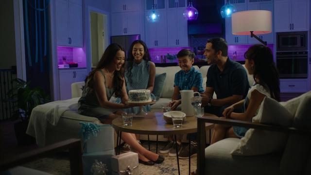 Birthday Party in Living Room with Purple lighting