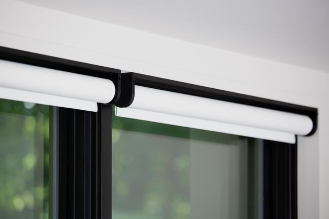 Close up of a Smart Shades mounted on a window